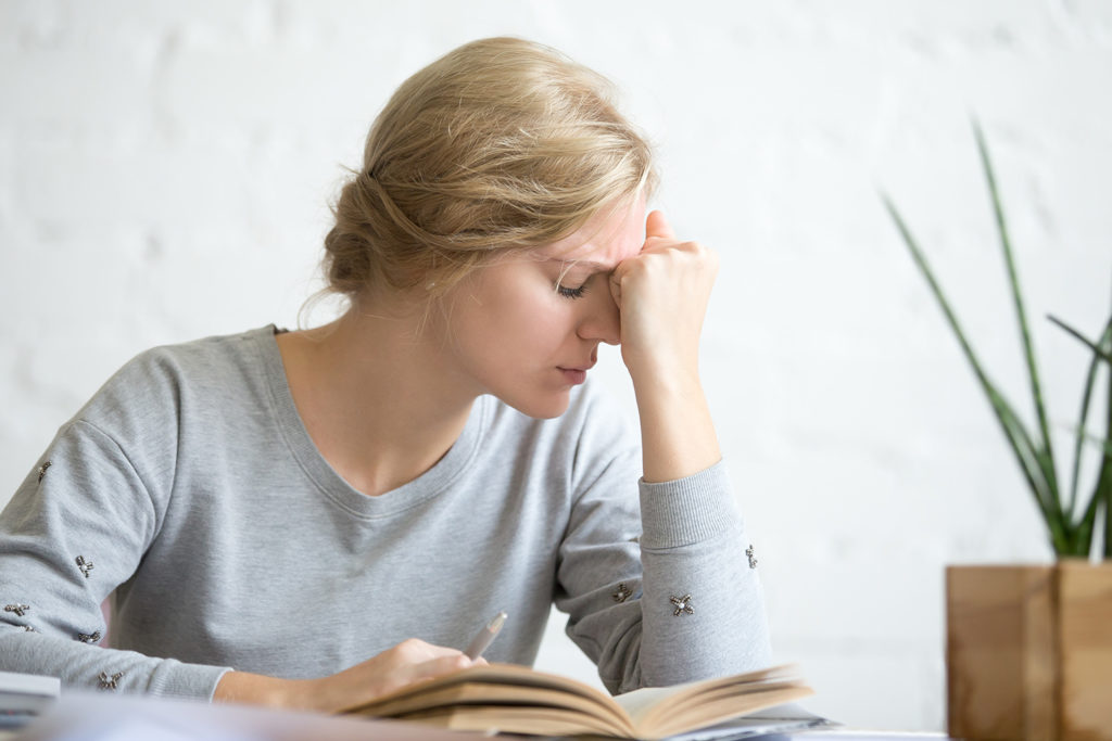 a girl suffering from vertigo