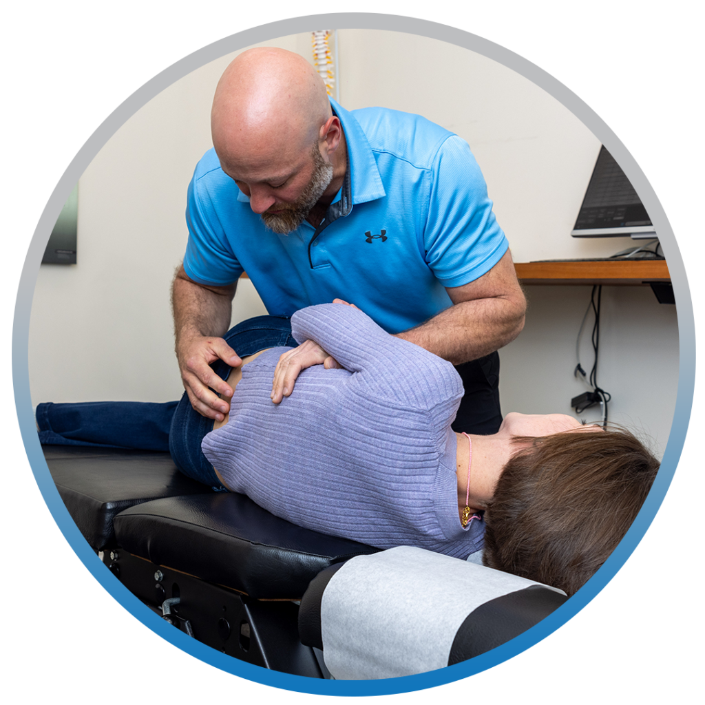 dr eric treating his patients hip pain